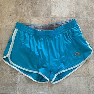 Turquoise Tracksmith women’s shorts